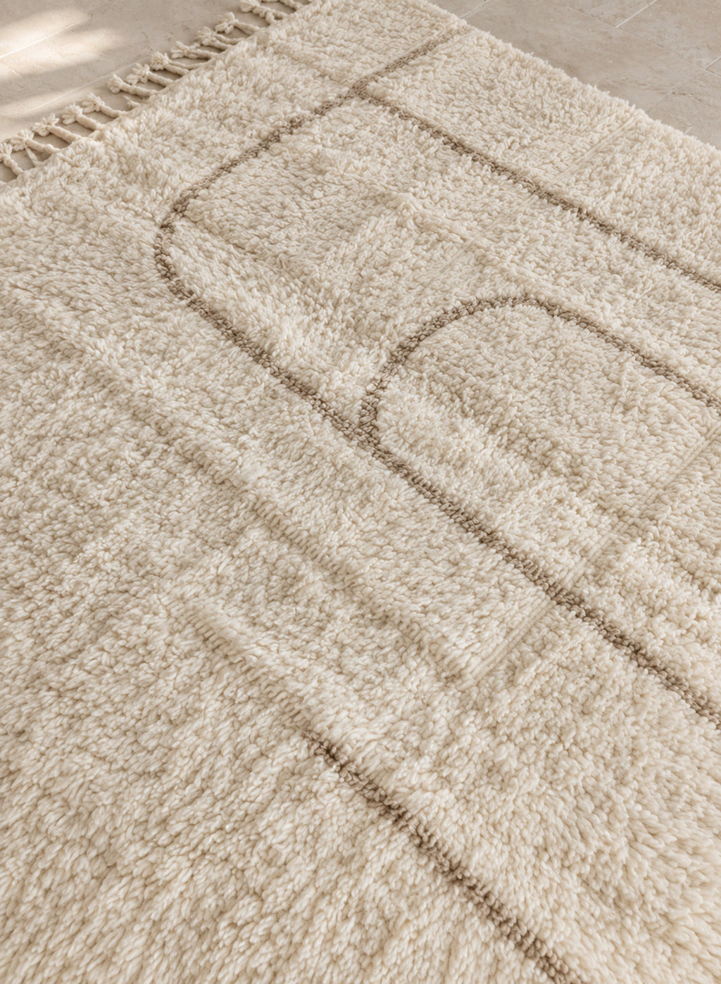 Surface of the Mrirt rug showing the wool pile