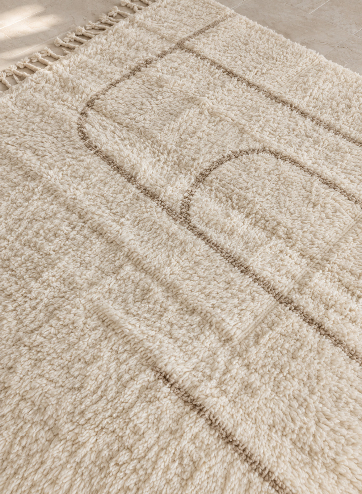 Surface of the Mrirt rug showing the wool pile