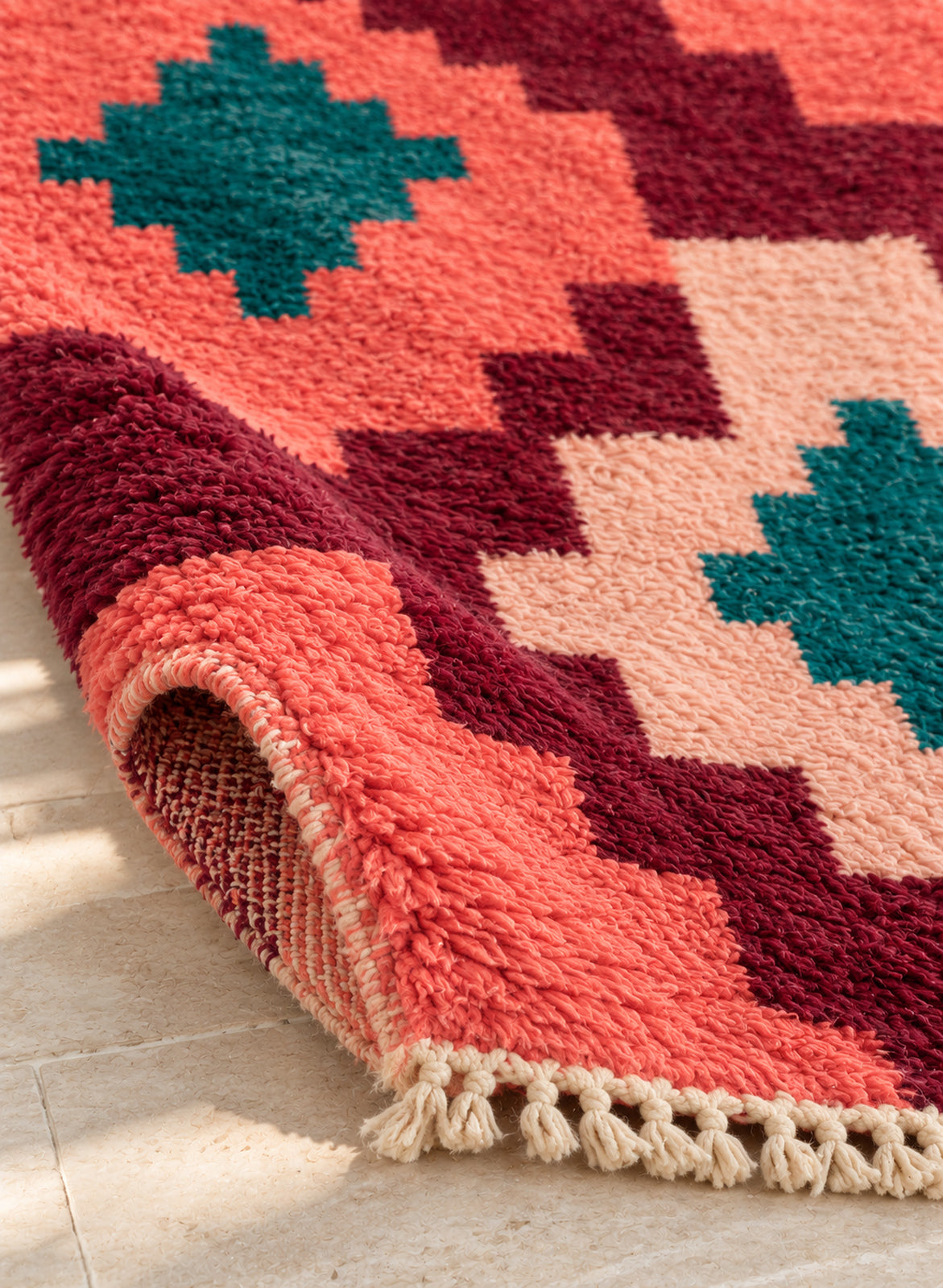 Folded corner showing the thickness of the Tilelli Boujaad rug