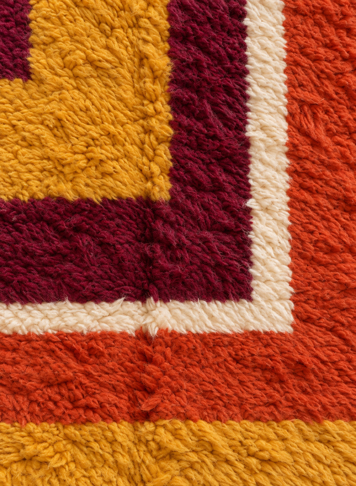 Close-up of the thick wool pile of the Tafukt Boujaad rug