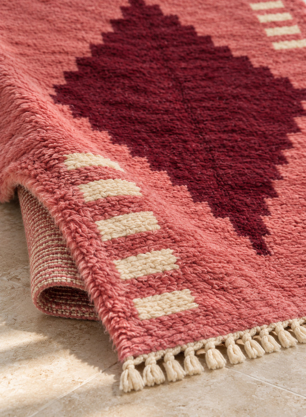 Folded corner of the Izri Boujaad rug