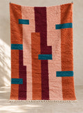 Terracotta Boujaad rug with vertical bands and teal accents, full view