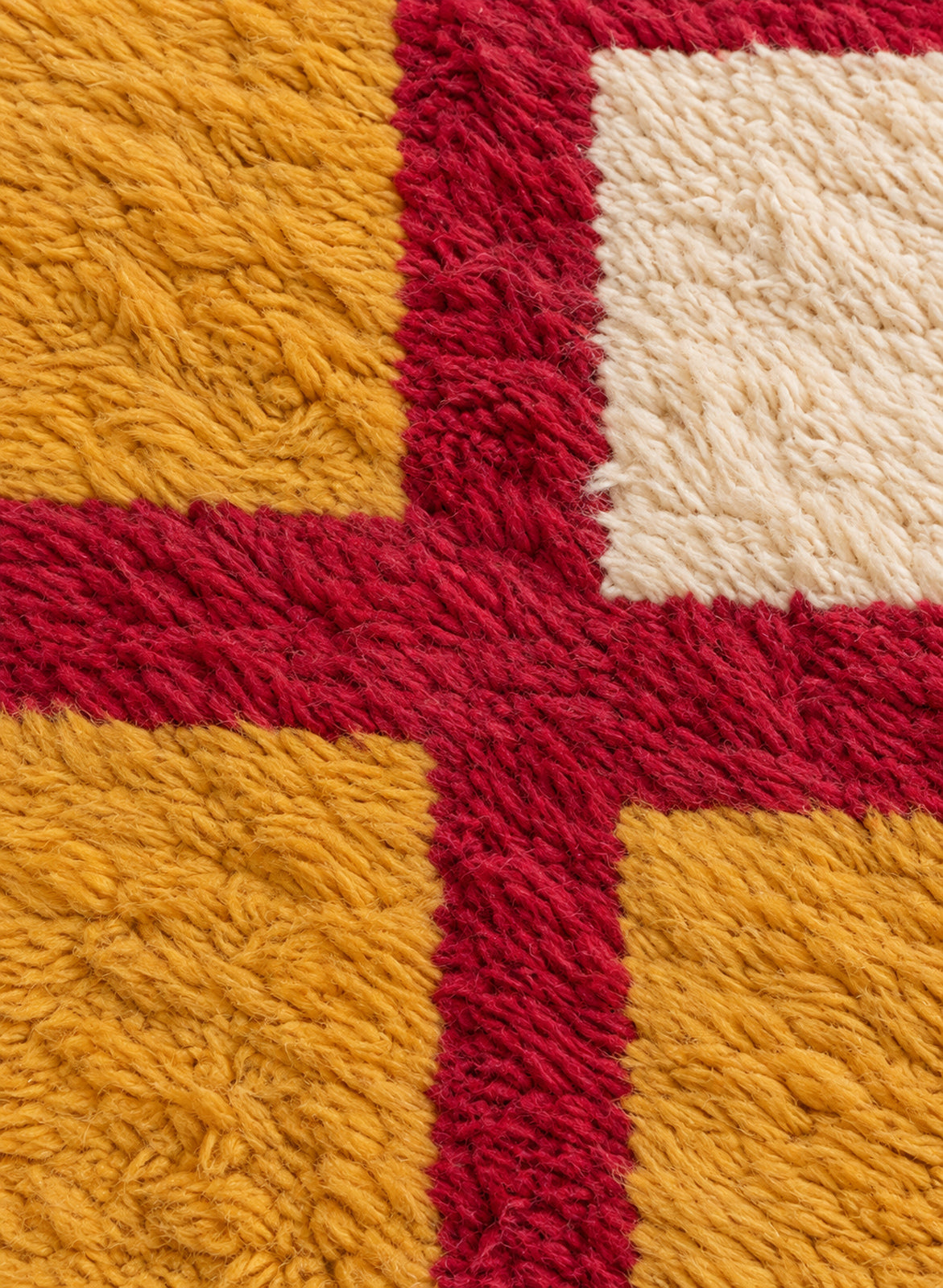 Close-up of the thick wool pile of the Tamimt Boujaad rug