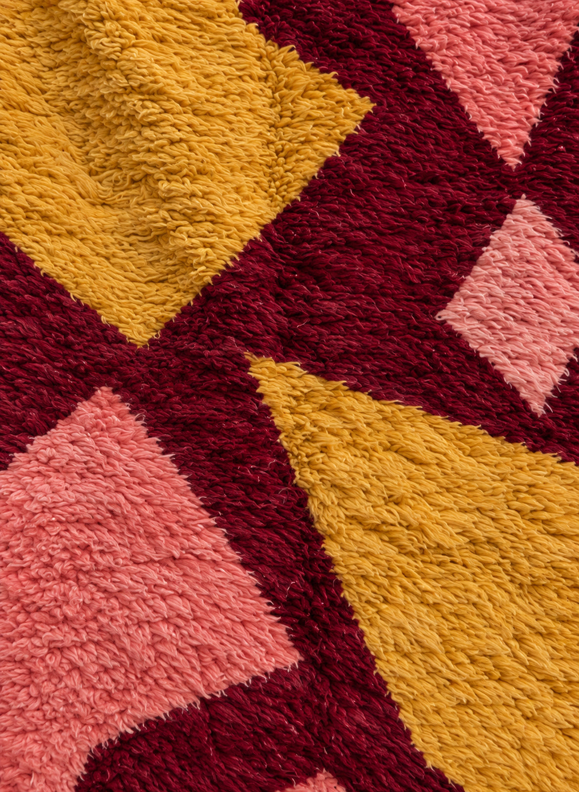 Close-up of the thick wool pile of the Tazart Boujaad rug