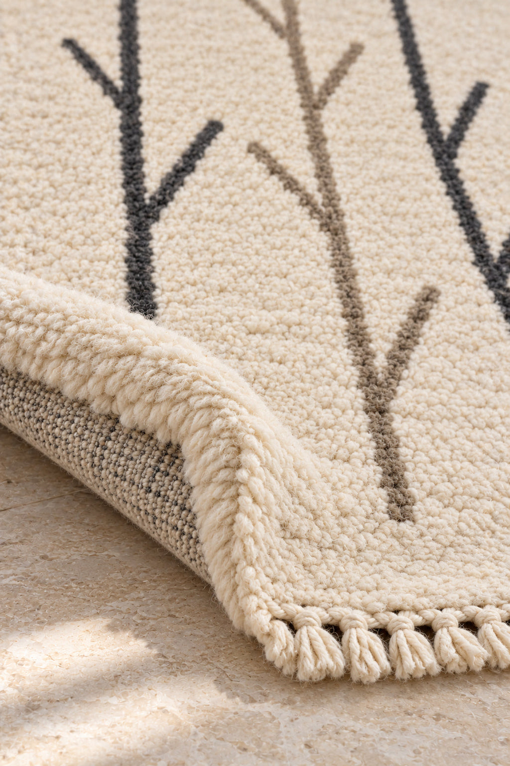 Thick pile of Beni Ourain rug model 03 on a folded corner
