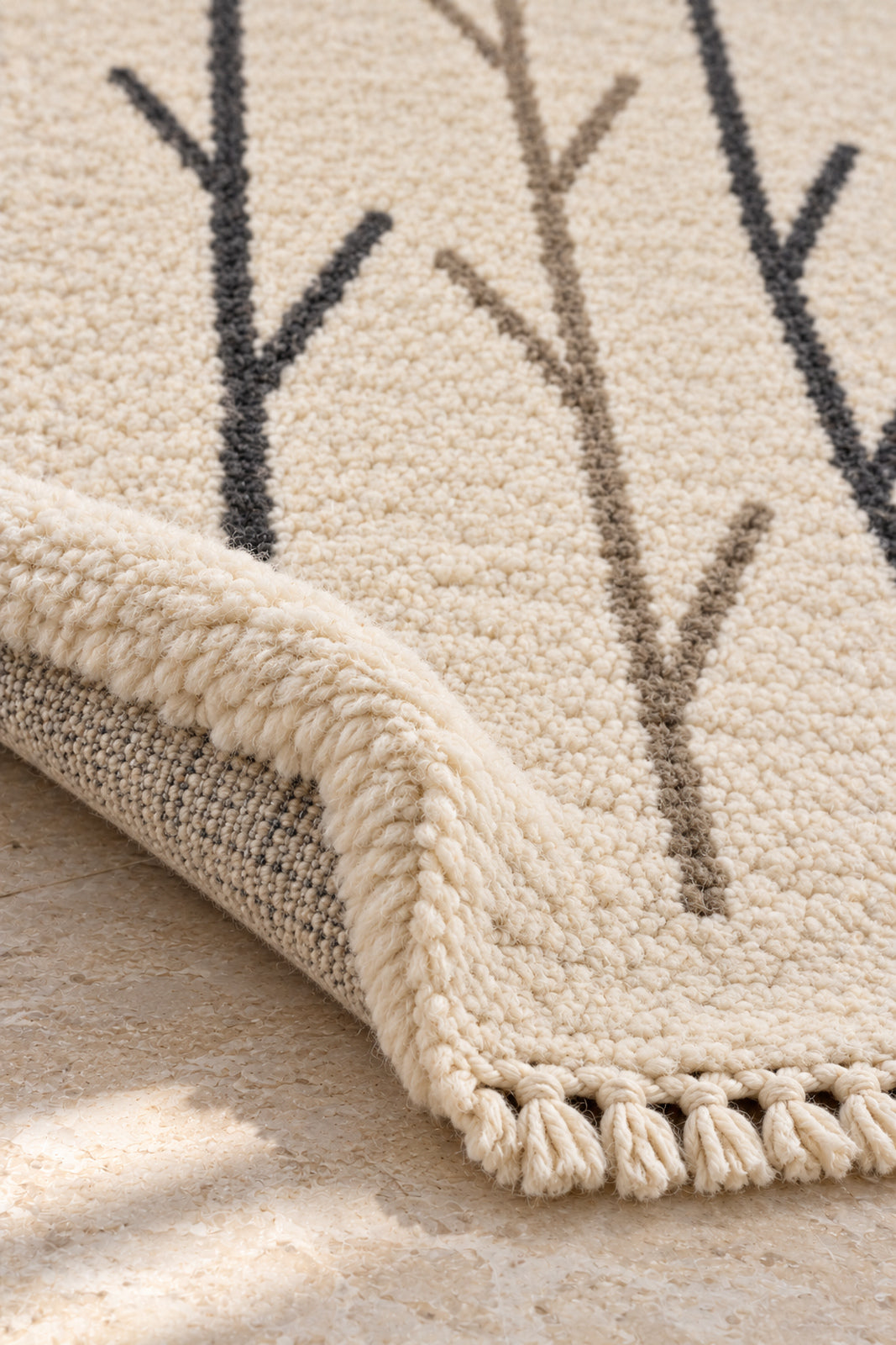 Thick pile of Beni Ourain rug model 03 on a folded corner