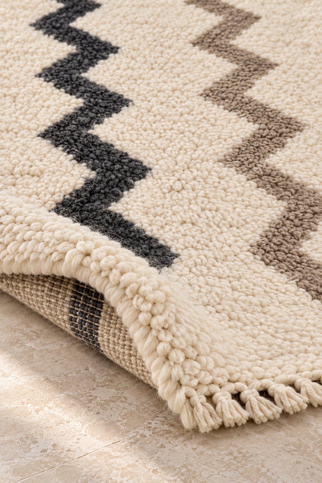 Thick pile of Beni Ourain rug model 10 on a folded corner