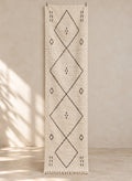 Ivory Beni Ourain runner with a charcoal diamond chain