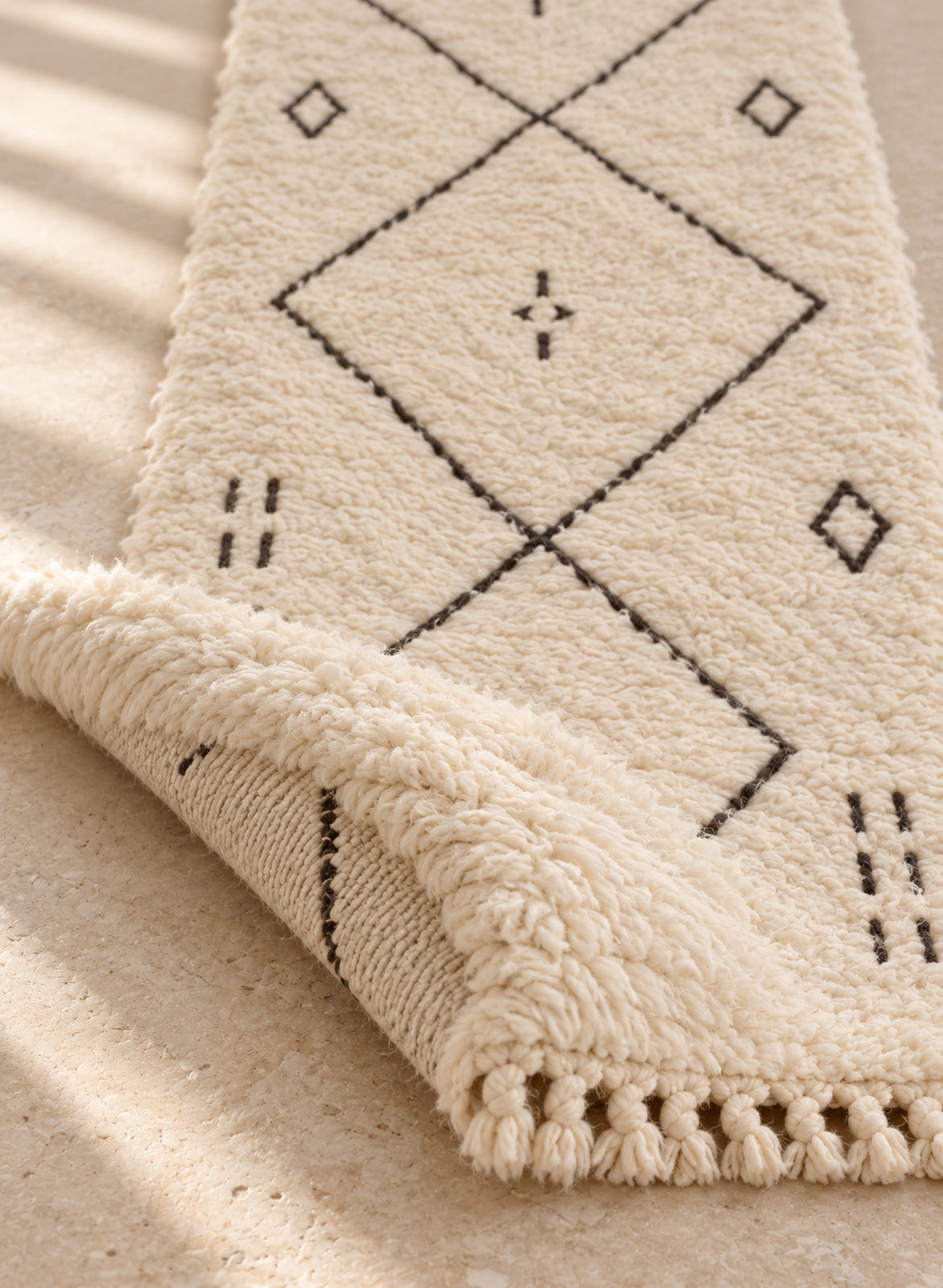 Folded Beni Ourain runner showing pile thickness