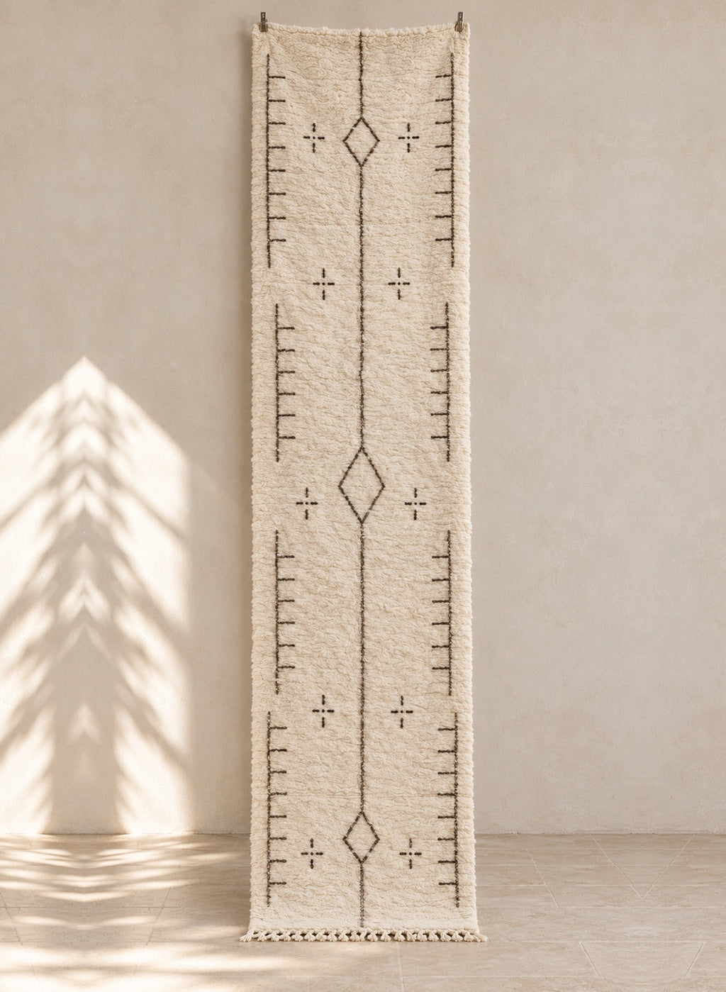 Ivory Beni Ourain runner with a charcoal centre line and comb marks