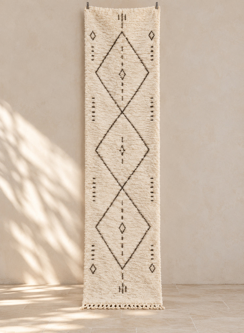 Ivory Beni Ourain runner with an elongated charcoal diamond chain