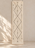 Ivory Beni Ourain runner with an elongated charcoal diamond chain