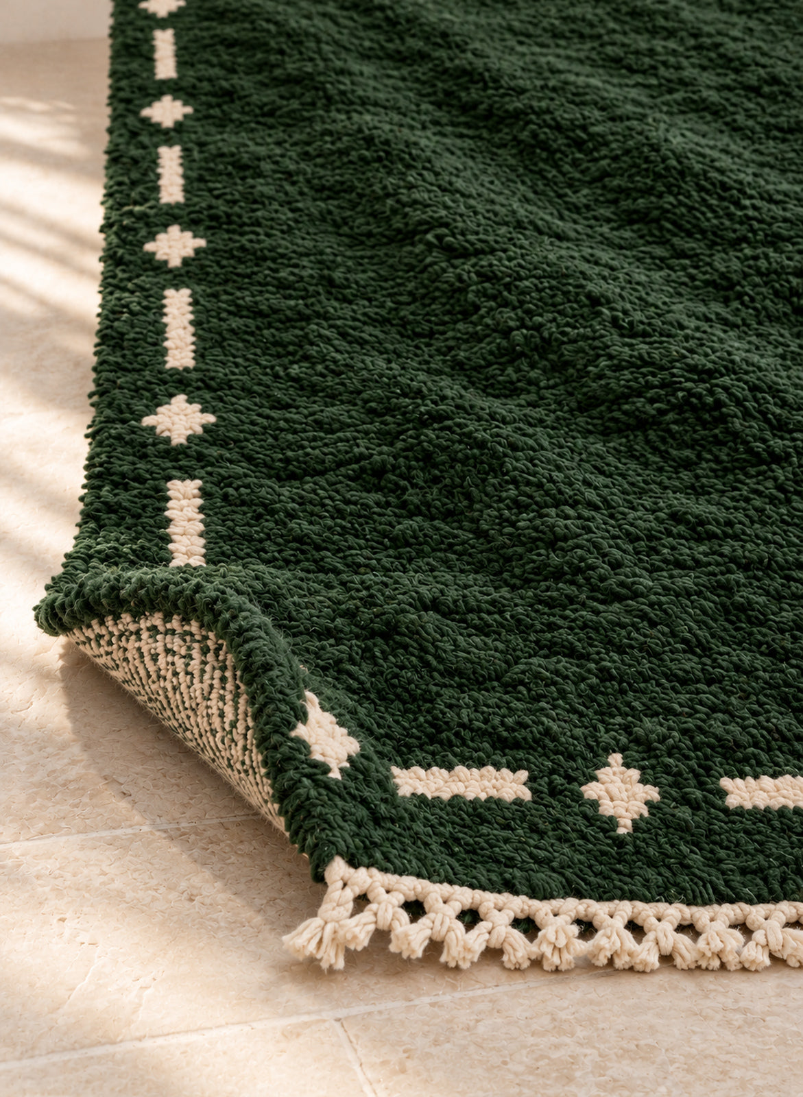 Thick pile of Beni Ourain rug model BWO-02 on a folded corner