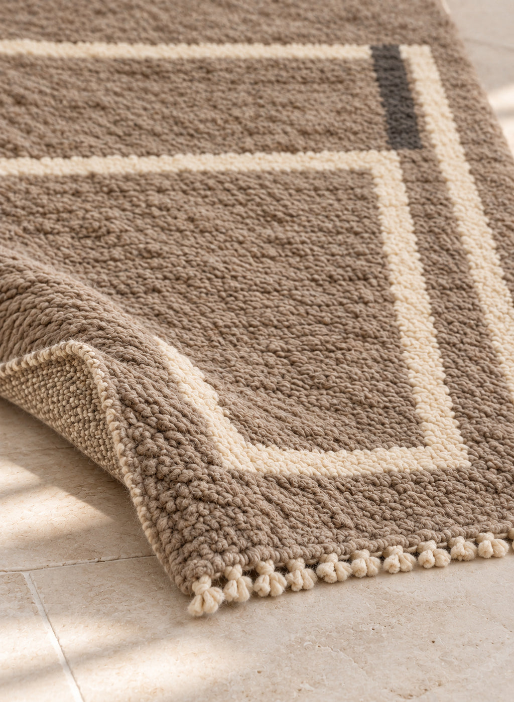 Thick pile of Beni Ourain rug model BWO-03 on a folded corner