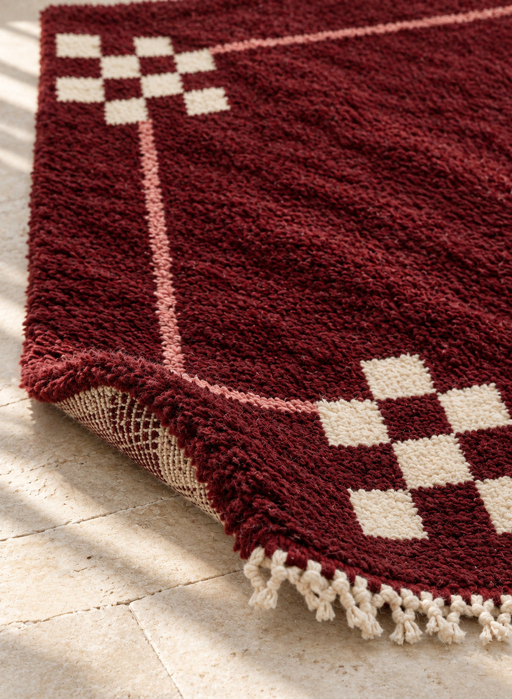 Thick pile of Beni Ourain rug model BWO-04 on a folded corner