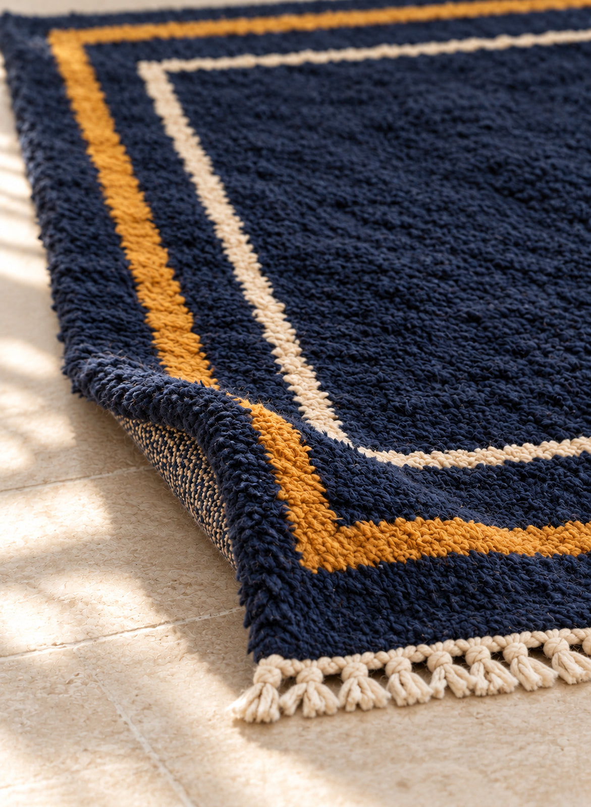 Thick pile of Beni Ourain rug model BWO-06 on a folded corner