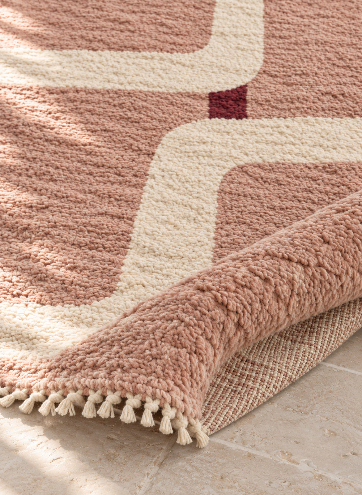 Thick pile of Beni Ourain rug model BWO-09 on a folded corner