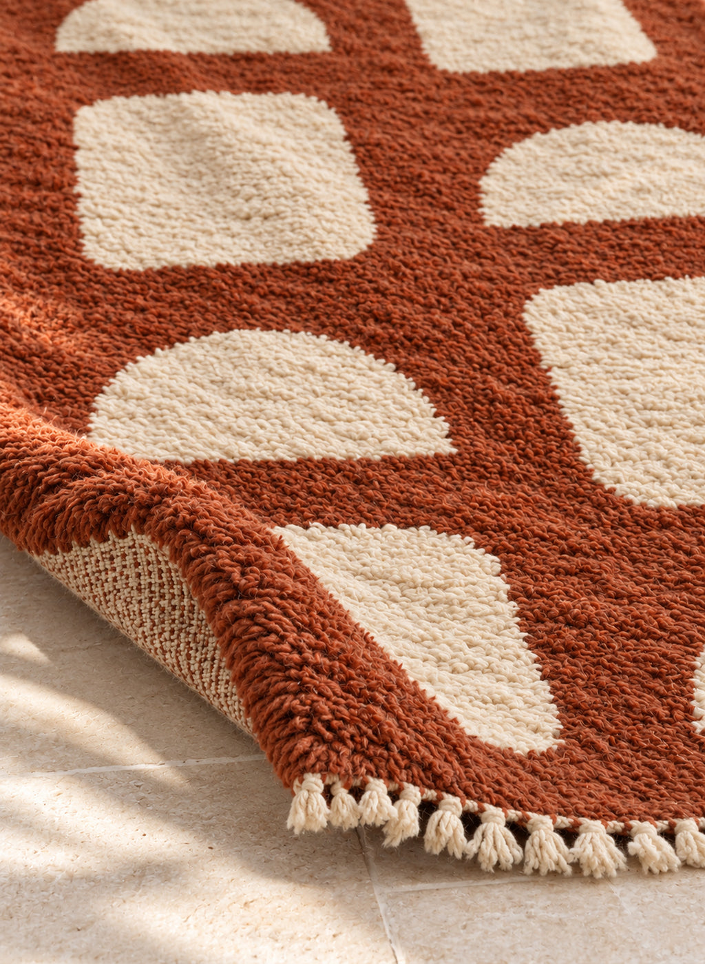 Thick pile of Beni Ourain rug model BWO-11 on a folded corner