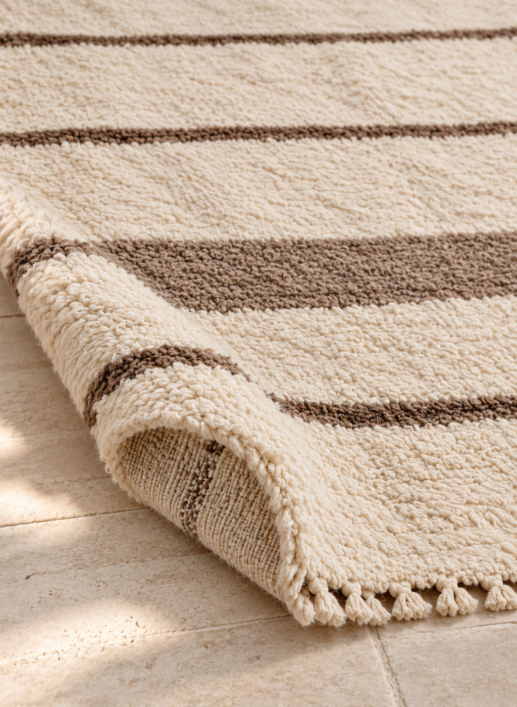 Thick pile of Beni Ourain rug model BWO-13 on a folded corner