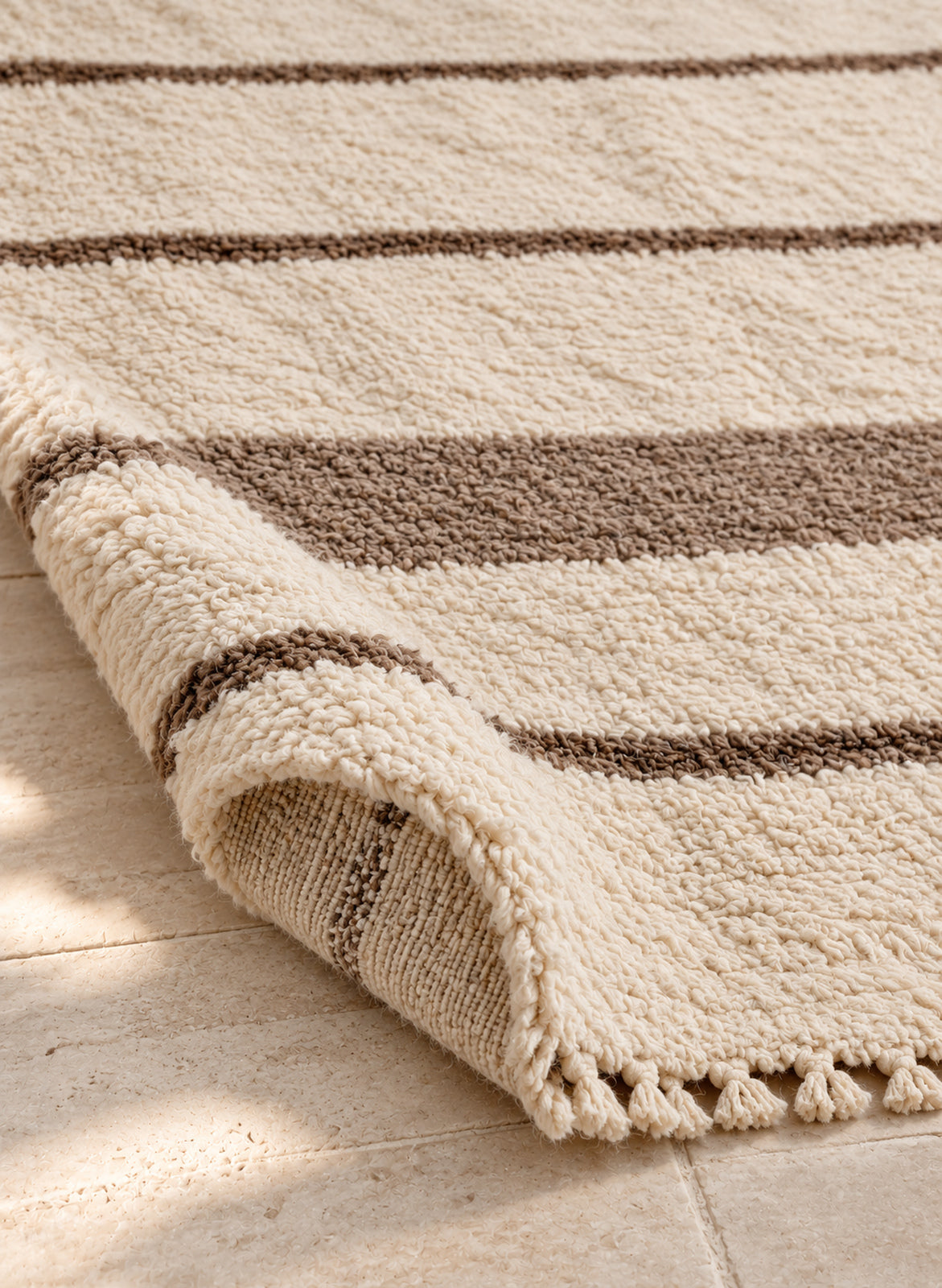 Thick pile of Beni Ourain rug model BWO-13 on a folded corner