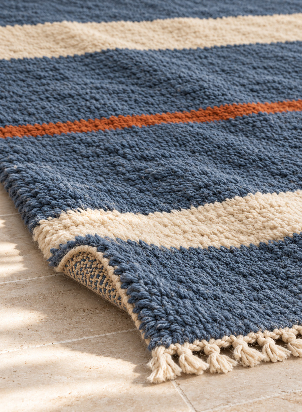 Thick pile of Beni Ourain rug model BWO-14 on a folded corner