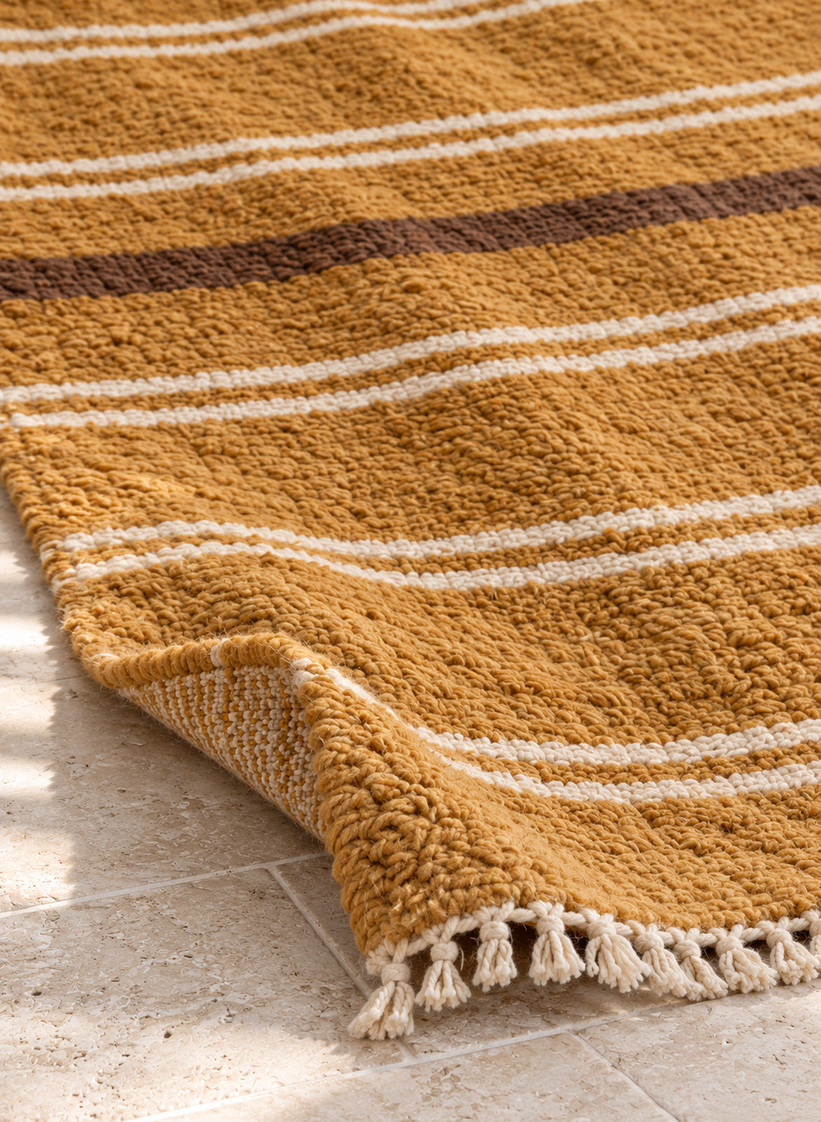 Thick pile of Beni Ourain rug model BWO-15 on a folded corner