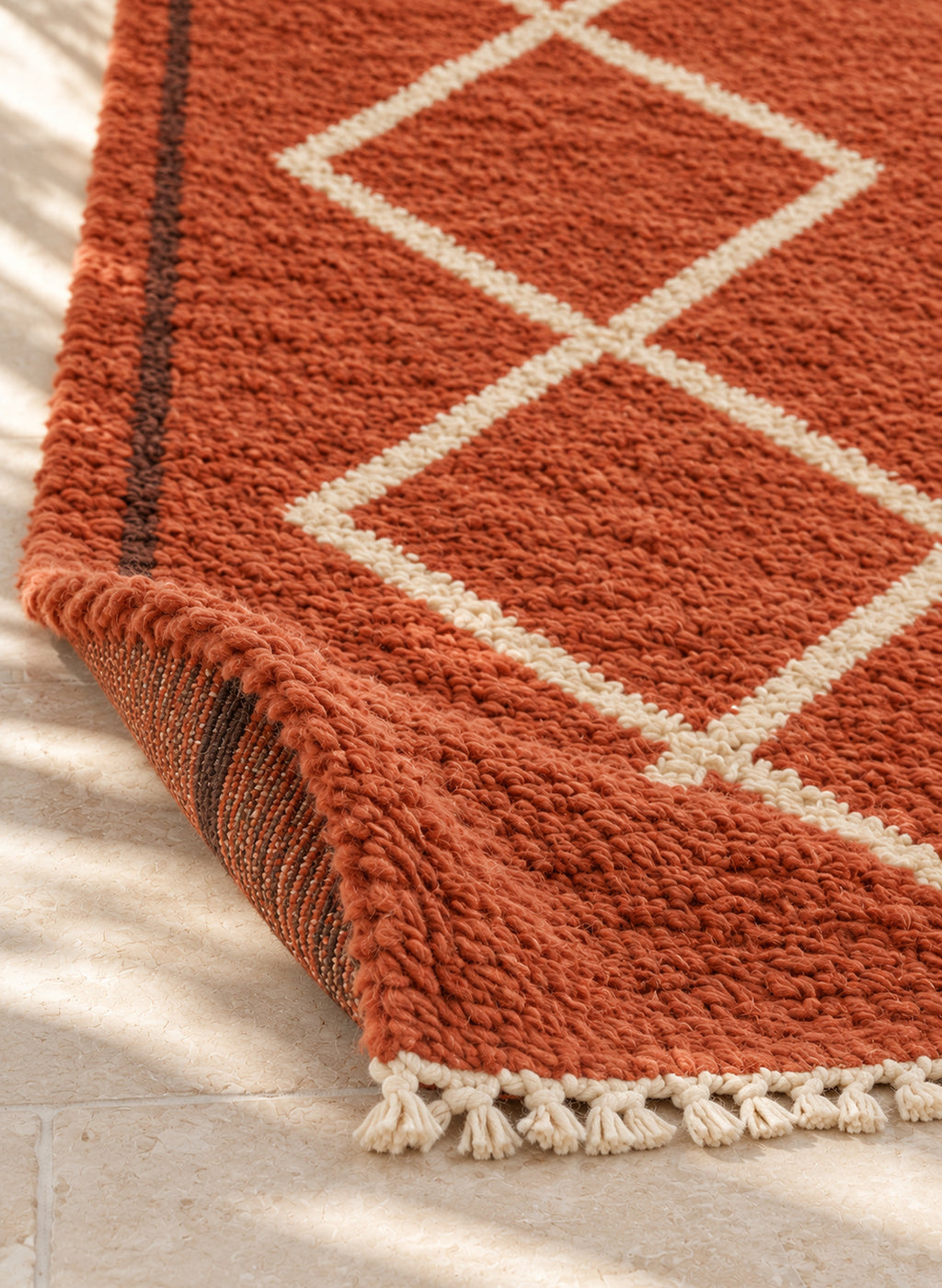 Thick pile of Beni Ourain rug model BWO-24 on a folded corner