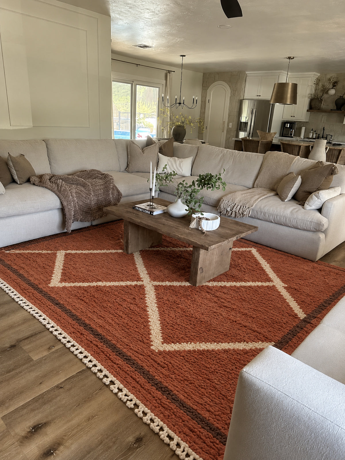 Terracotta Beni Ourain rug with an ivory diamond chain in a styled interior