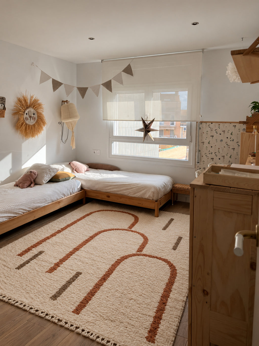 Ivory Beni Ourain rug with rust arches in a styled interior