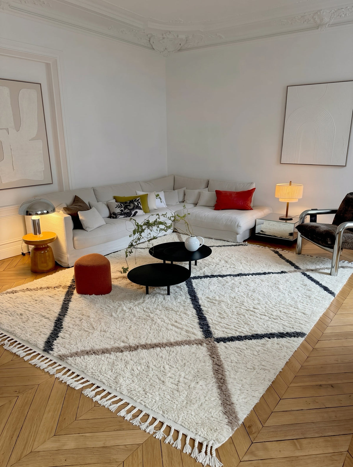 Ivory Beni Ourain rug with wide charcoal and taupe diamonds in a living room