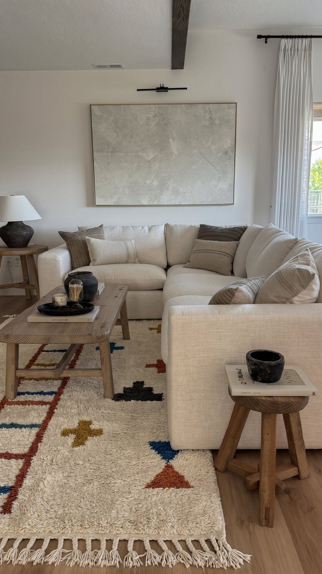 Ivory Azilal rug with a terracotta ladder and crosses in a living room