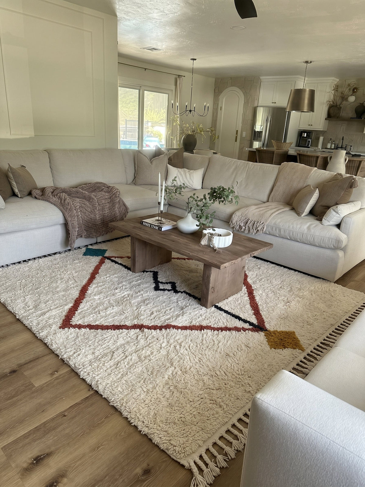 Ivory Azilal rug with a terracotta diamond outline in a living room