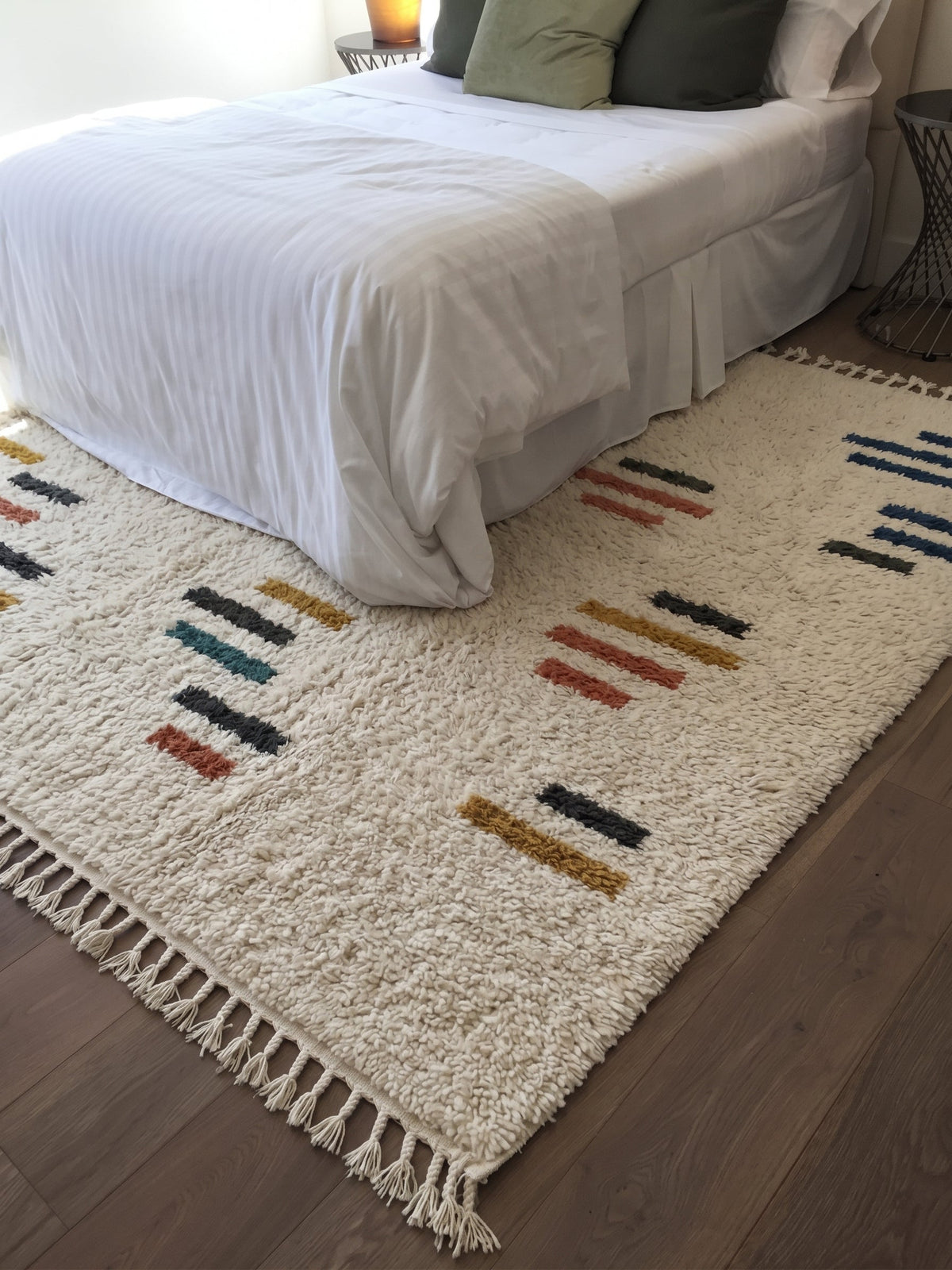 Ivory Azilal rug with colorful dashes in a bedroom
