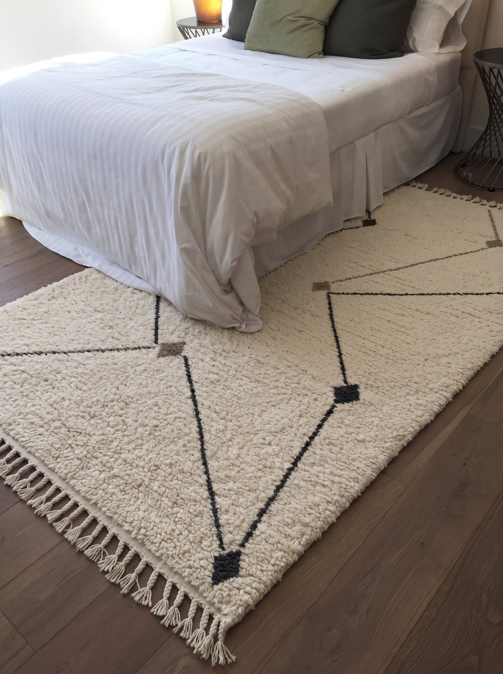 Ivory Beni Ourain rug with angular paths in a bedroom