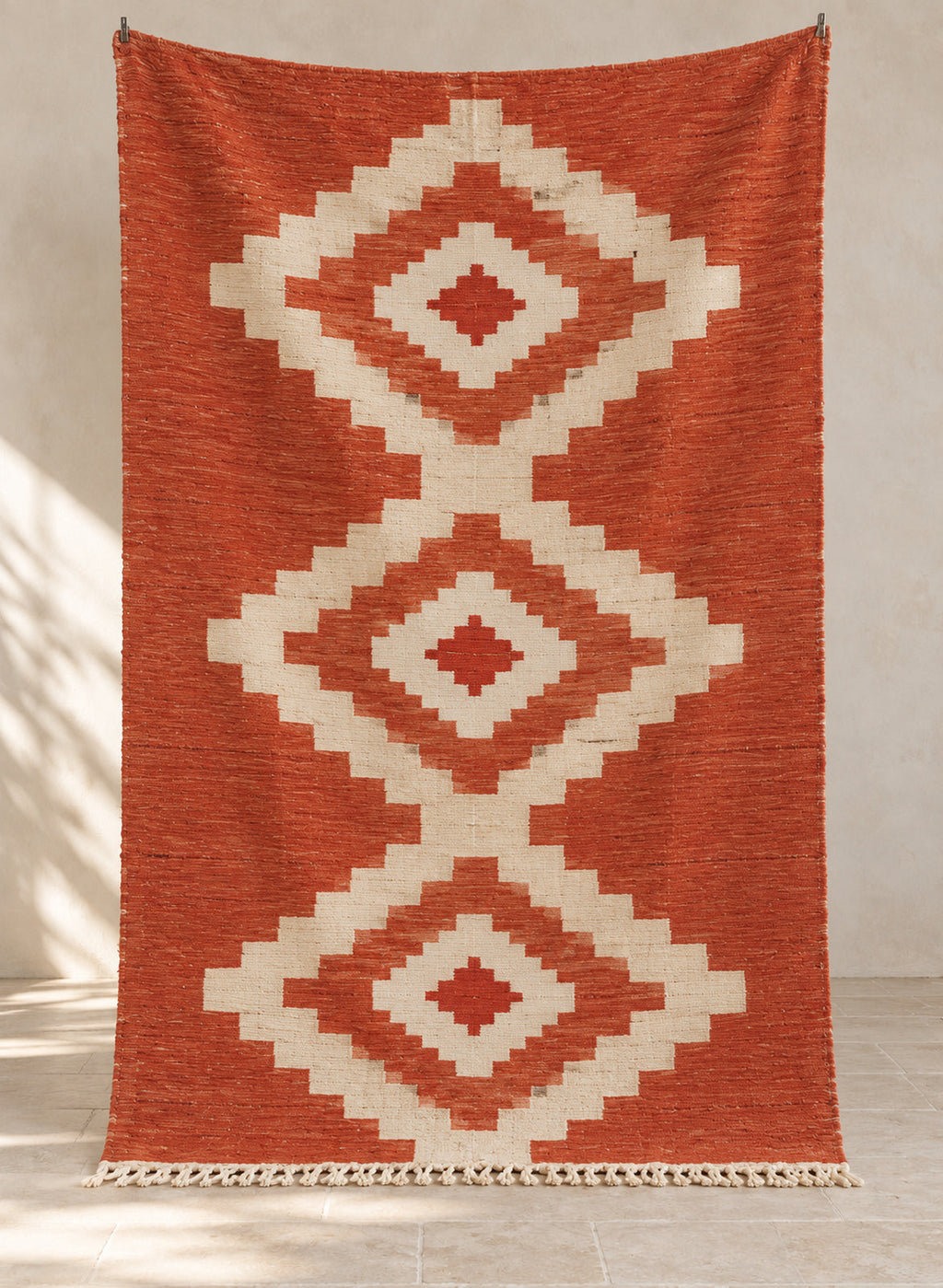 Terracotta Taslit kilim with ivory diamond medallions, full view