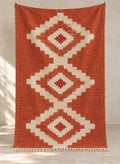 Terracotta Taslit kilim with ivory diamond medallions, full view