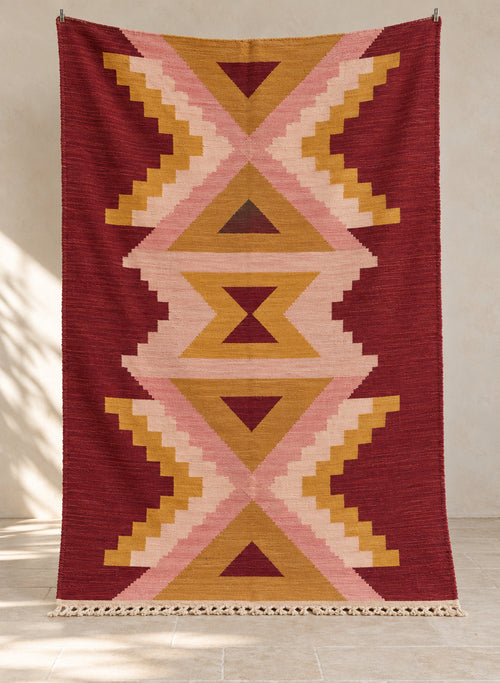Burgundy Tala kilim with pink and mustard hourglass, full view