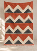 Terracotta Asmoun kilim with charcoal and ivory triangles, full view