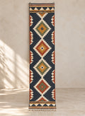 Navy kilim runner with rust and green diamond medallions
