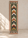 Green kilim runner with rust and ivory chevrons