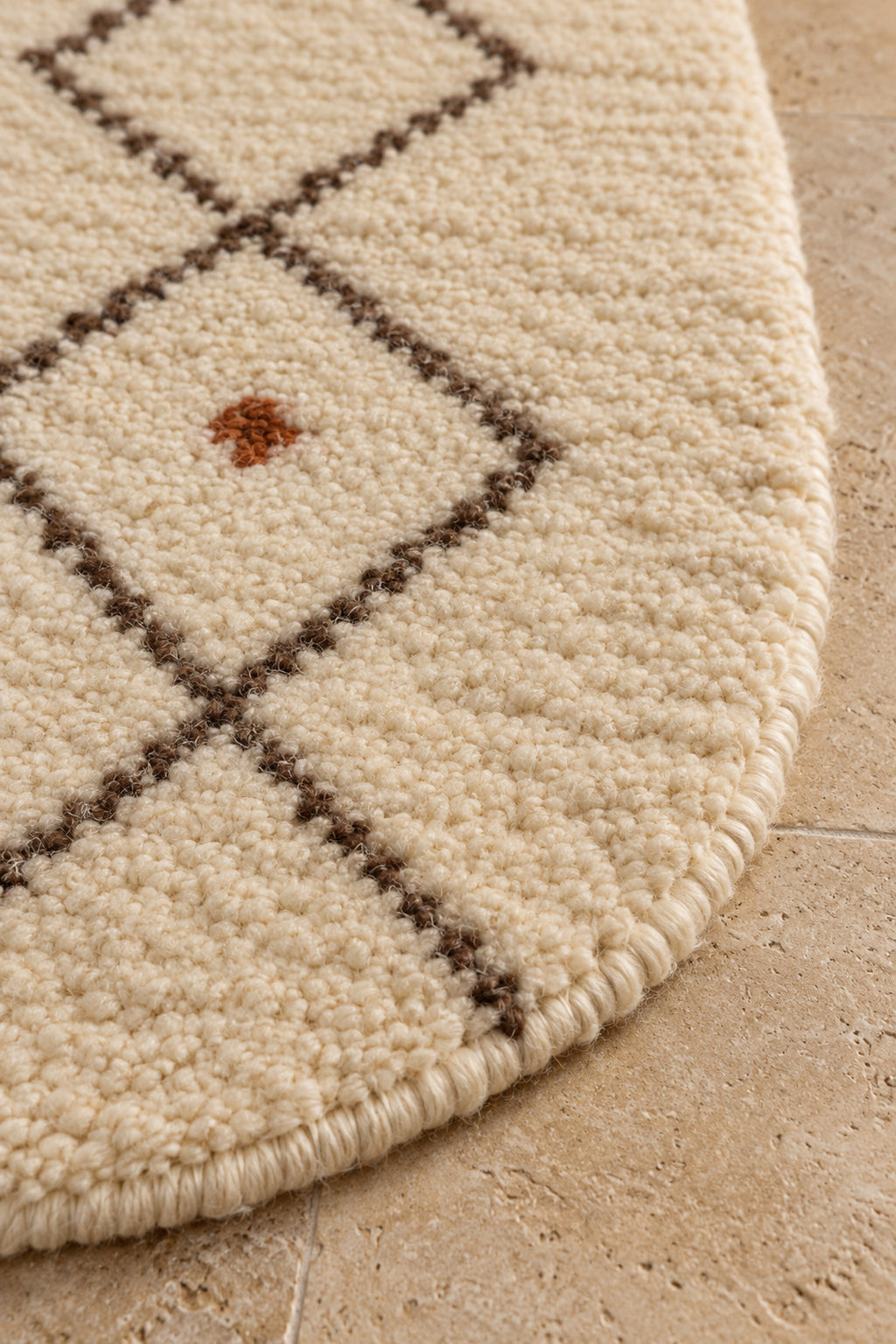 Edge detail of Beni Ourain oval rug model TF-01