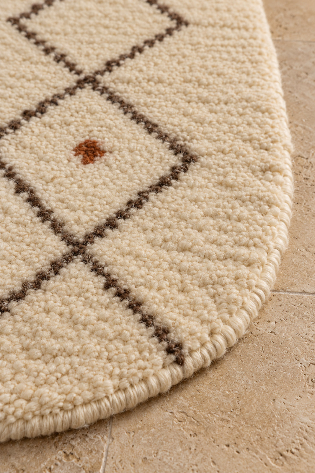 Edge detail of Beni Ourain oval rug model TF-01