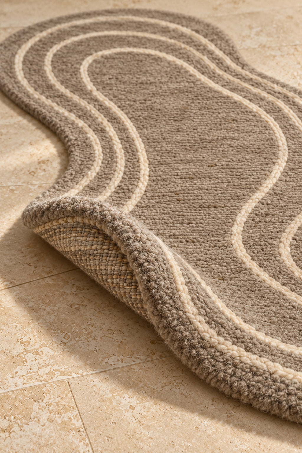 Thick pile of Beni Ourain shaped rug model TF-02 on a folded corner