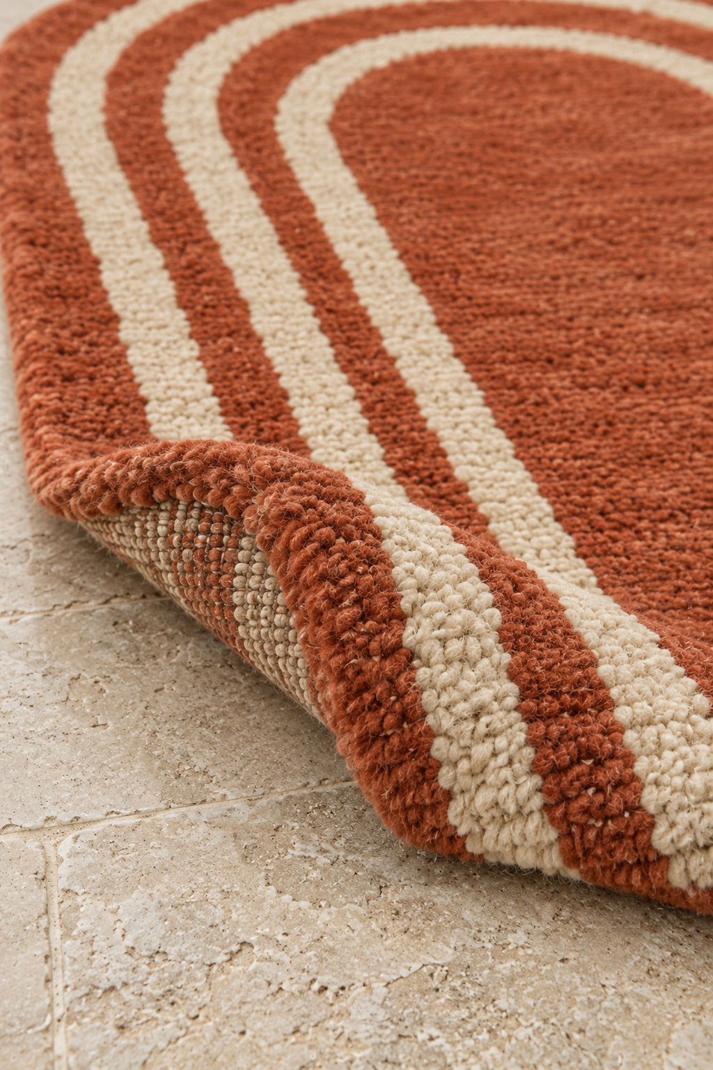 Thick pile of Beni Ourain arch rug model TF-04 on a folded corner