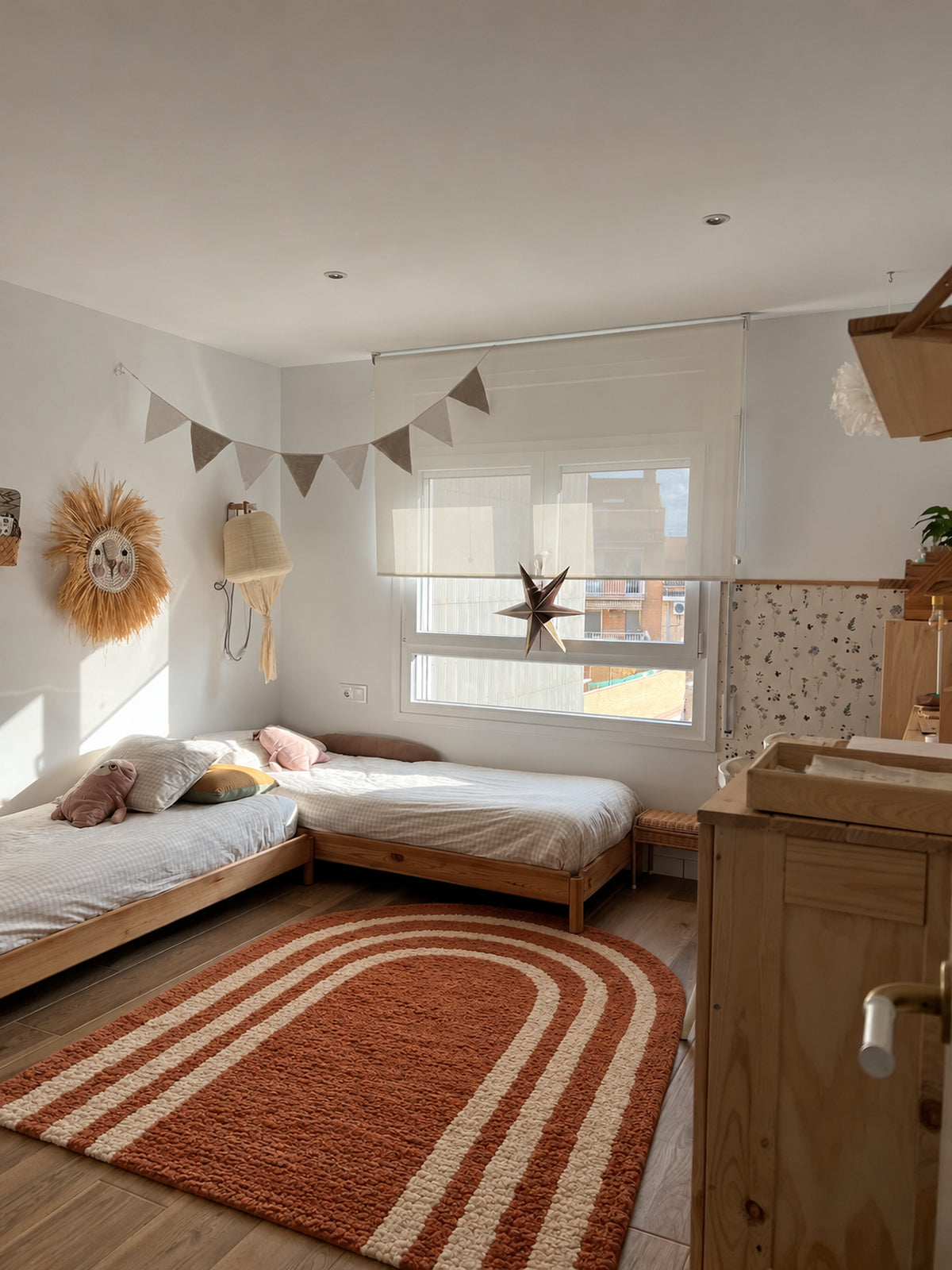 Terracotta Beni Ourain arch rug with ivory rainbow arches in a styled interior