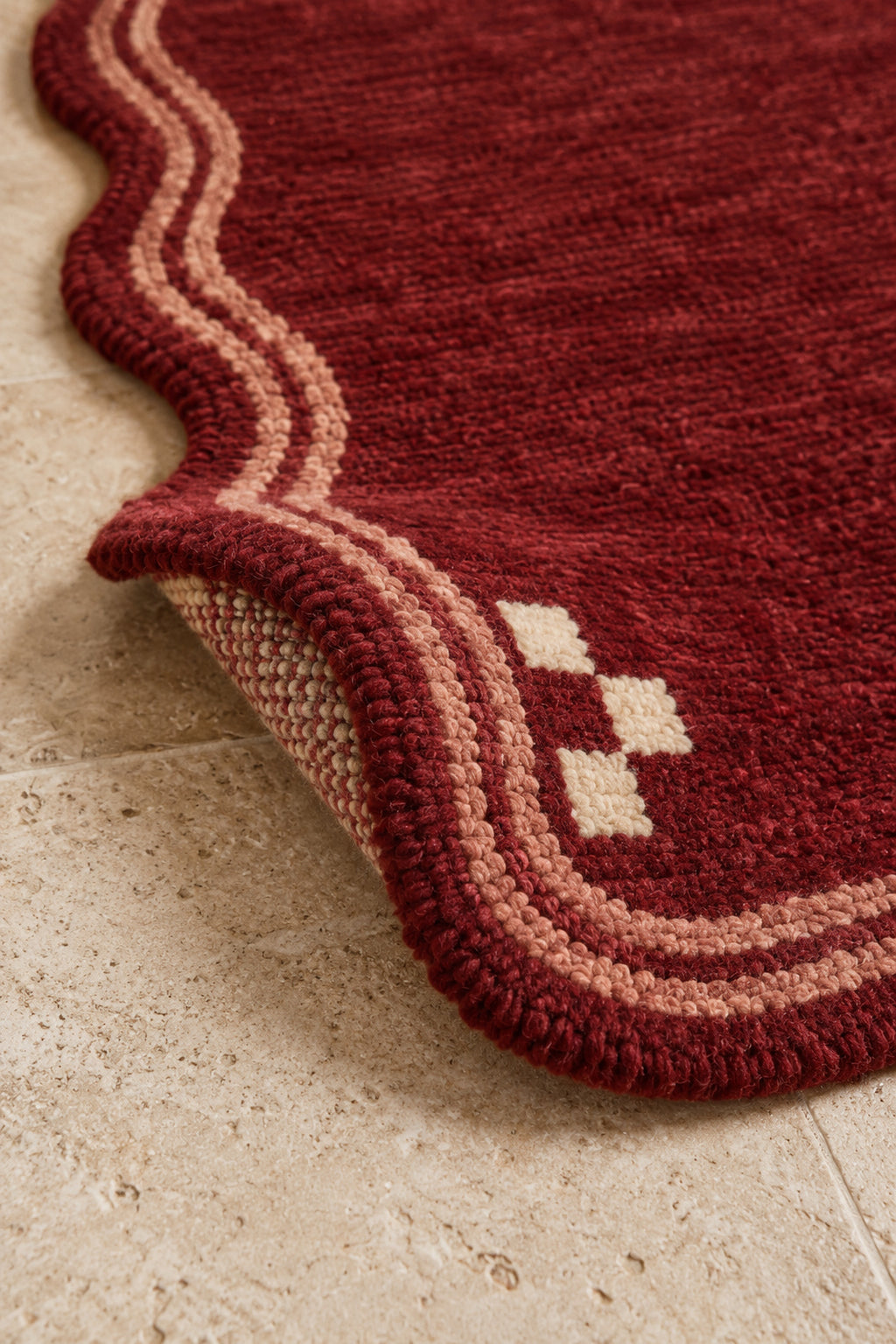 Thick pile of Beni Ourain rug model TF-05 on a folded corner